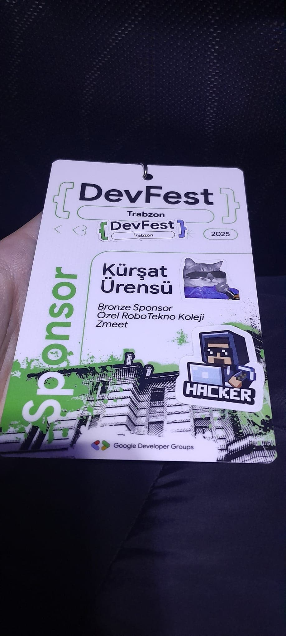 GDG DevFest Trabzon 2025 sponsor yaka kartı: Kürşat Ürensü, Bronze Sponsor — Özel RoboTekno Koleji, ZMeet
